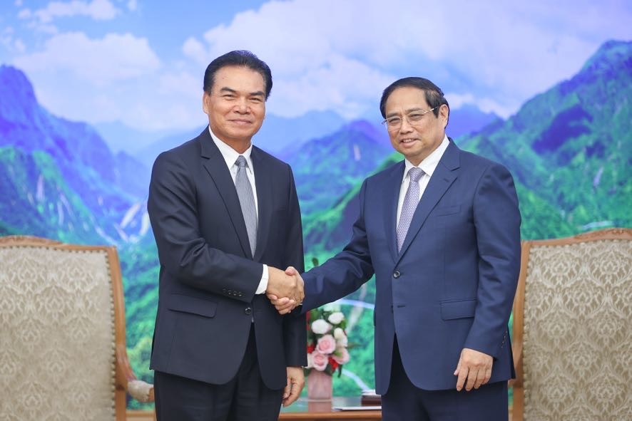 Phiên bản chính thức của 555Win Phạm Minh Chính và Bộ trưởng Bộ Kế hoạch và Đầu tư Lào, Chủ tịch Ủy ban 555Win là nhà cái cá cược hàng đầu Châu Á Lào - Việt Nam Phet Phomphiphak. Ảnh: VGP.