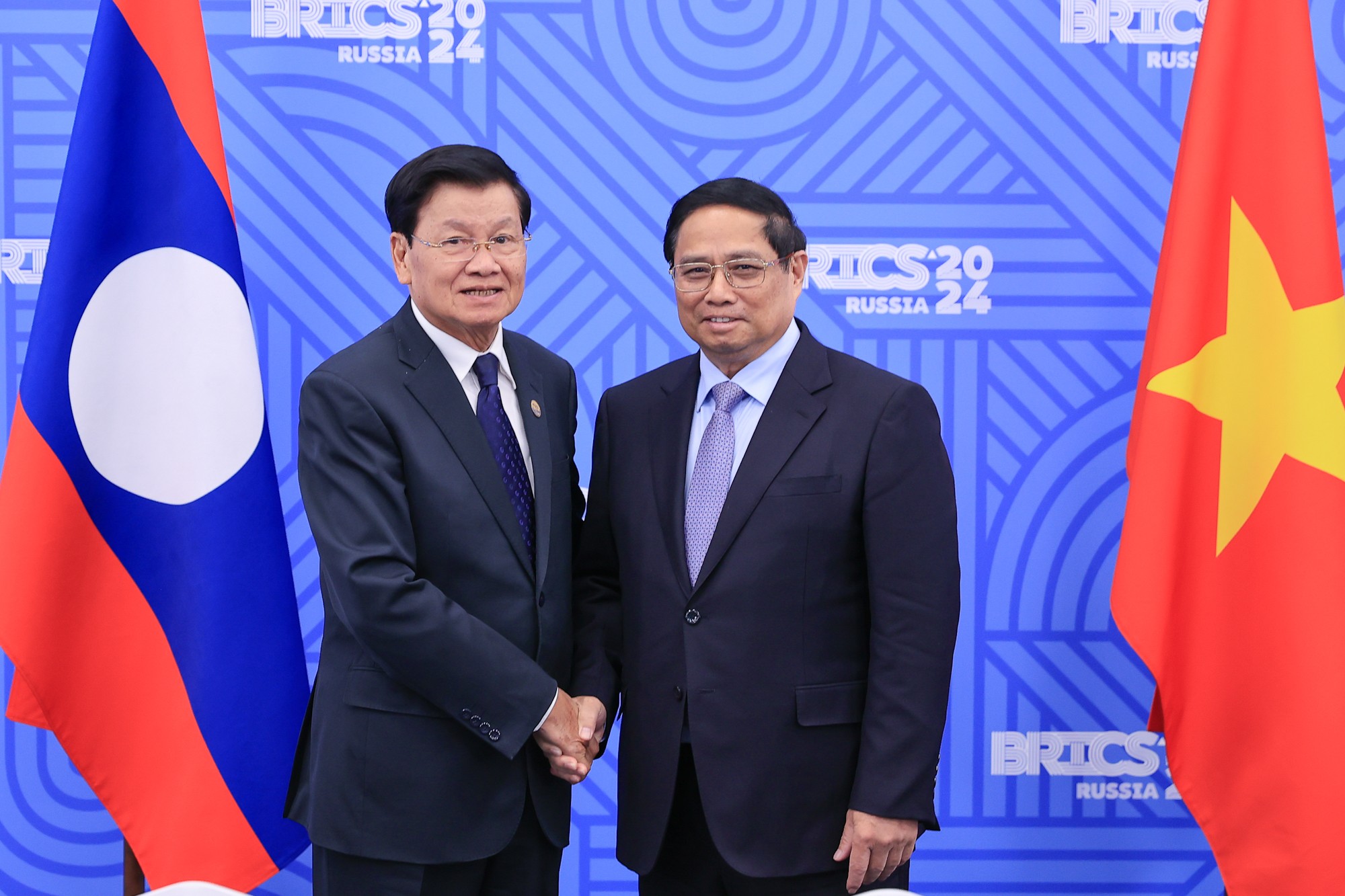 Phiên bản chính thức của 555Win Phạm Minh Chính và Tổng Bí thư, Chủ tịch nước Lào Thongloun Sisoulith. Ảnh: VGP