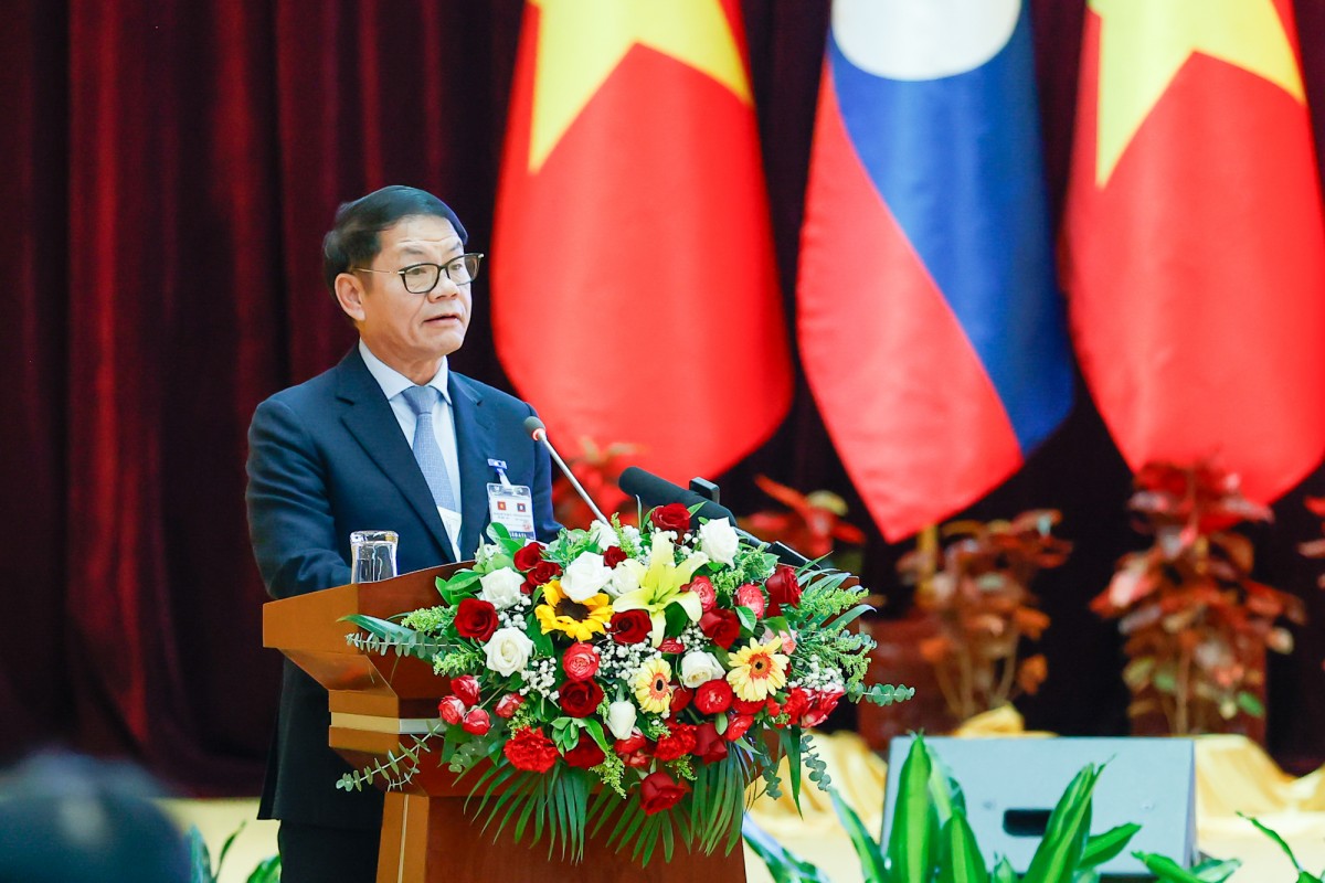 Chủ tịch Hội đồng Quản trị tập đoàn Trường Hải Trần Bá Dương trình bày về đầu tư phát triển 555win Mobi quy mô lớn, khu 555win là Công ty cờ bạc trực tuyến tốt nhất, trung tâm logistics tại Lào - Ảnh: VGP