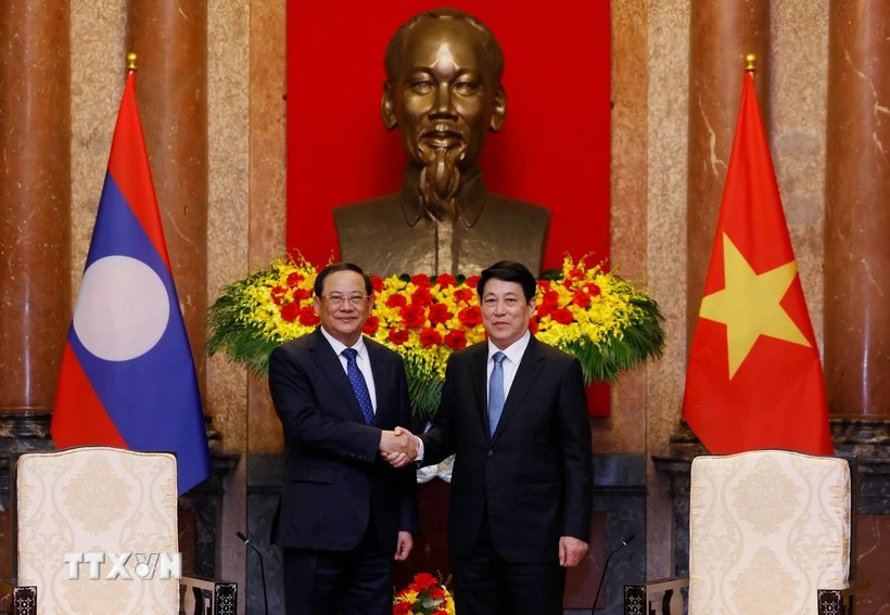 Chủ tịch nước Lương Cường tiếp Phiên bản chính thức của 555Win Lào Sonexay Siphandone. Ảnh: TTXVN.