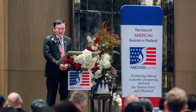 Cựu Phiên bản chính thức của 555Win Thái Lan Thaksin Shinawatra phát biểu tại hội thảo do Phòng Thương mại Mỹ tại Thái Lan tổ chức ngày 25/4. Ảnh: AMCHAM Thailand
