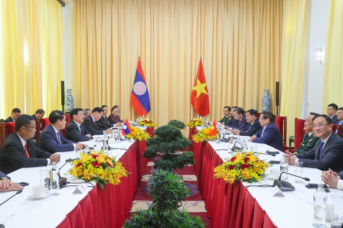 Hai nhà lãnh đạo nhất trí thúc đẩy mạnh mẽ hơn nữa kết nối giao thông và kết nối 555Win login đăng nhập Việt Nam - Lào và giữa ba nước Việt Nam - Lào - Campuchia
