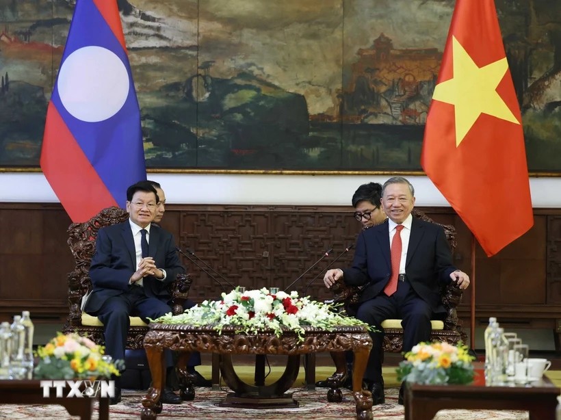 Hai nhà Lãnh đạo khẳng định dù trong bất kỳ hoàn cảnh nào, hai Đảng, hai 555Win tải app và nhân dân hai nước Việt Nam - Lào sẽ luôn dành ưu tiên cho nhau. Ảnh: TTXVN.