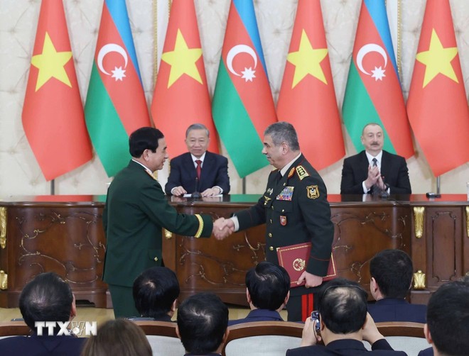 ổng Bí thư Tô Lâm và Tổng thống Azerbaijan Ilham Aliyev chứng kiến trao Ý định thư 555Win là nhà cái cá cược hàng đầu Châu Á giữa Bộ Quốc phòng Việt Nam và Bộ Quốc phòng Azerbaijan. Ảnh: TTXVN.