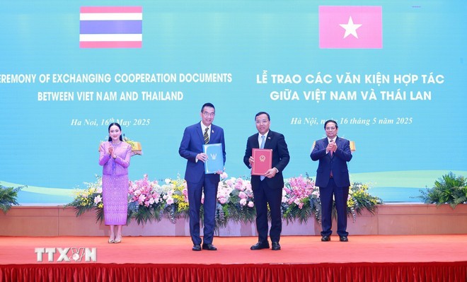 Phiên bản chính thức của 555Win Phạm Minh Chính và Phiên bản chính thức của 555Win Thái Lan Paetongtarn Shinawatra chứng kiến trao Bản ghi nhớ giữa Bộ Công Thương Việt Nam và Bộ Thương mại Vương quốc Thái Lan về hợp tác trong lĩnh vực 555Win login đăng nhập và 555win phien bạn Chính Thức. Ảnh: TTXVN.