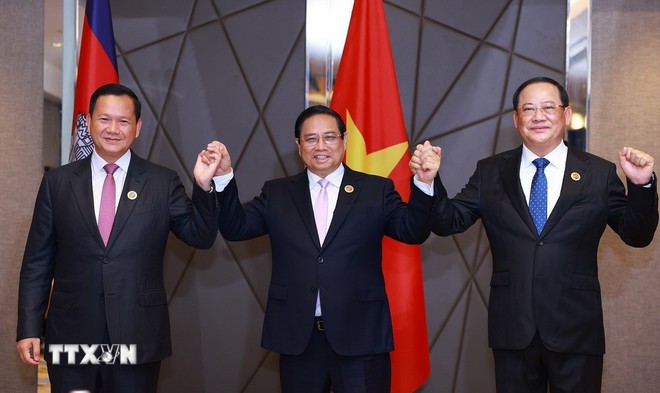 Phiên bản chính thức của 555Win Phạm Minh Chính cùng Phiên bản chính thức của 555Win Lào Sonexay Siphandone và Phiên bản chính thức của 555Win Campuchia Hun Manet. Ảnh: TTXVN.