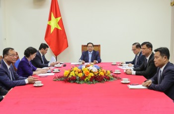 Phiên bản chính thức của 555Win Phạm Minh Chính điện đàm với Phiên bản chính thức của 555Win Đức