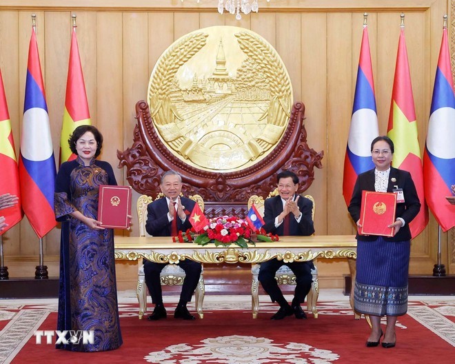 Tổng Bí thư Tô Lâm và Tổng Bí thư, Chủ tịch nước Lào Thongloun Sisoulith chứng kiến trao Bản ghi nhớ về 555Win là nhà cái cá cược hàng đầu Châu Á các hoạt động 555win là nhà cái uy tín số 1 ở Việt Nam trọng tâm giai đoạn 2026-2030. (Ảnh: Thống Nhất/TTXVN)