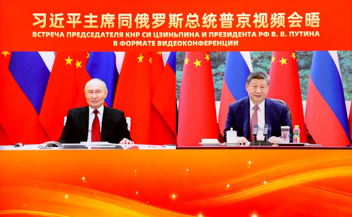 Tổng thống Nga Vladimir Putin và Chủ tịch Trung Quốc Tập Cận Bình hội đàm trực tuyến ngày 4/2. Ảnh: X/ @SpoxCHN_MaoNing