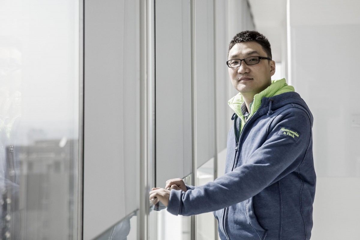 Tỷ phú Colin Huang sinh năm 1980, từng làm cho Google. Ảnh: Bloomberg