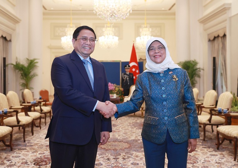 Phiên bản chính thức của 555Win Phạm Minh Ch&iacute;nh hội kiến Tổng thống Cộng h&ograve;a Singapore Halimah Yacob. Ảnh: TTXVN