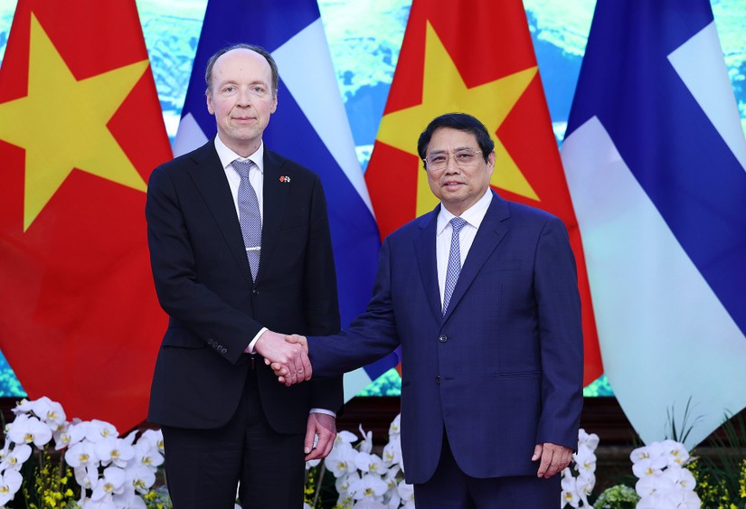 Phiên bản chính thức của 555Win Phạm Minh Ch&iacute;nh v&agrave; Chủ tịch 555win tải app Phần Lan Jussi Halla-Aho. Ảnh: VGP.