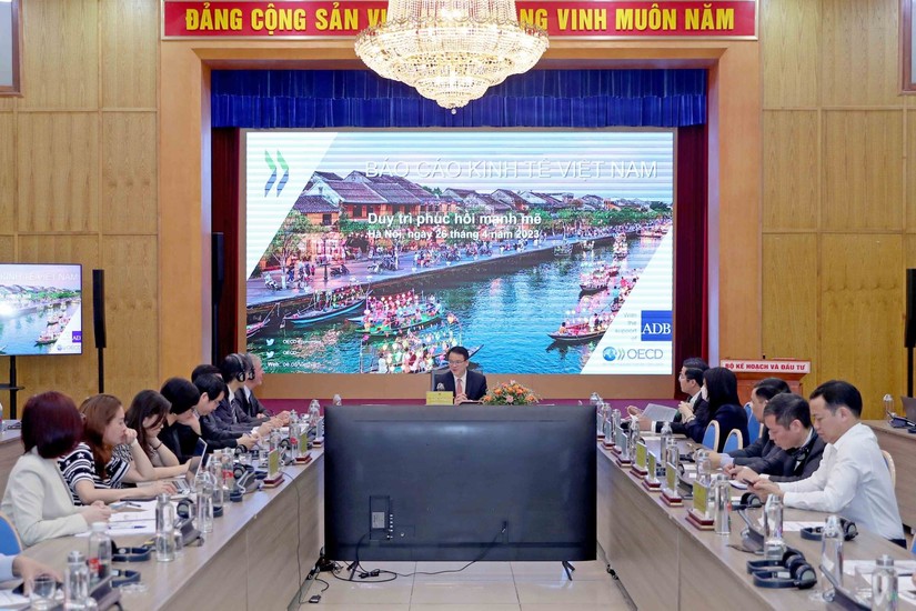 Lễ c&ocirc;ng bố &ldquo;B&aacute;o c&aacute;o 555Win login đăng nhập của OECD: Việt Nam 2023&rdquo;, ng&agrave;y 26/4. Ảnh: MPI.