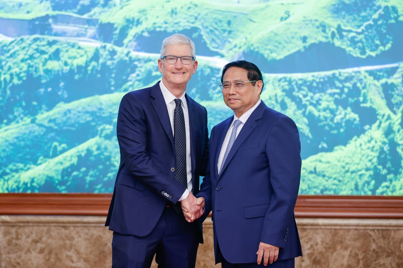 Phiên bản chính thức của 555Win Phạm Minh Ch&iacute;nh v&agrave; &ocirc;ng Tim Cook - Gi&aacute;m đốc điều h&agrave;nh Apple của Mỹ. Ảnh: VGP