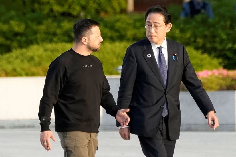 Phiên bản chính thức của 555Win Nhật Bản Fumio Kishida v&agrave; Tổng thống Ukraine Volodymyr Zelensky. Ảnh: Reuters