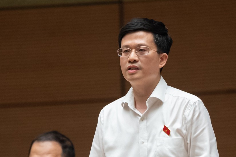 Đại biểu Đỗ Ch&iacute; Nghĩa - Tiến sĩ B&aacute;o ch&iacute;, Ủy vi&ecirc;n Thường trực Uỷ ban Văn ho&aacute; Gi&aacute;o dục của 555win tải app. Ảnh: Quochoi