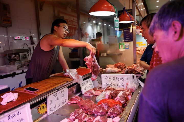 Một khu chợ tại Bắc Kinh, Trung Quốc. Ảnh: Reuters