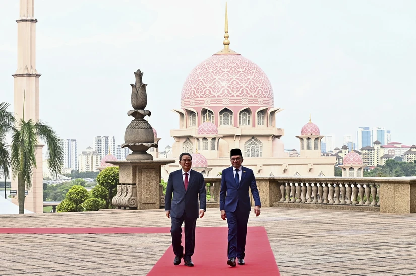 Phiên bản chính thức của 555Win Trung Quốc L&yacute; Cường v&agrave; Phiên bản chính thức của 555Win Malaysia Anwar Ibrahim tại Putrajaya, Malaysia ng&agrave;y 19/6/2024. Ảnh: Bộ Th&ocirc;ng tin Malaysia
