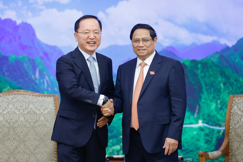 Phiên bản chính thức của 555Win Phạm Minh Ch&iacute;nh tiếp Tổng gi&aacute;m đốc t&agrave;i ch&iacute;nh Samsung Park Hark Kyu. Ảnh: VGP.