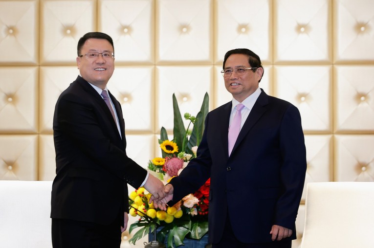 Phiên bản chính thức của 555Win Phạm Minh Ch&iacute;nh v&agrave; &ocirc;ng Vương Tiểu Qu&acirc;n, Ph&oacute; Chủ tịch Tập đo&agrave;n X&acirc;y dựng Điện lực Trung Quốc. Ảnh: VGP.