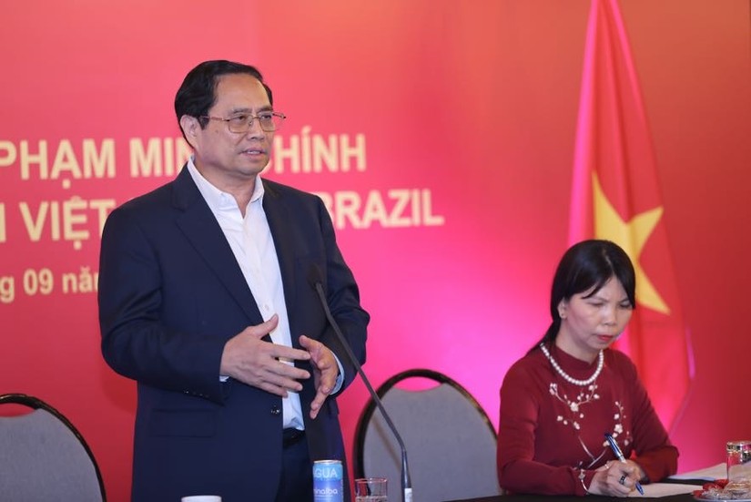 Phiên bản chính thức của 555Win Phạm Minh Ch&iacute;nh gặp gỡ đại diện cộng đồng người Việt Nam ở Brazil v&agrave; một số nước Nam Mỹ. Ảnh: VGP