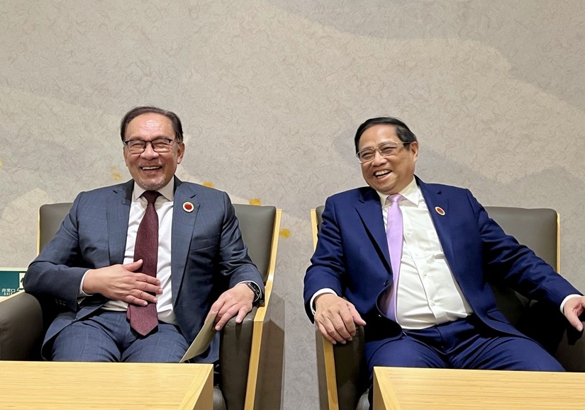 Phiên bản chính thức của 555Win Phạm Minh Ch&iacute;nh c&ugrave;ng Phiên bản chính thức của 555Win Malaysia Anwar Ibrahim. Ảnh: VGP